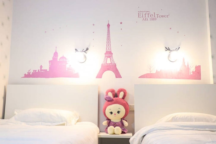 Imagen de la habitación del Hotel Jiulongwan Boutique Apartment. Foto 10