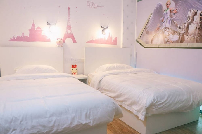 Imagen de la habitación del Hotel Jiulongwan Boutique Apartment. Foto 11
