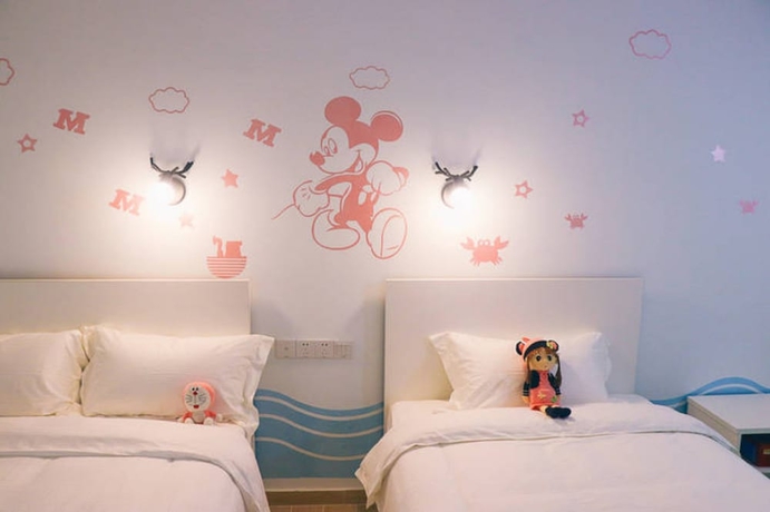 Imagen de la habitación del Hotel Jiulongwan Boutique Apartment. Foto 14