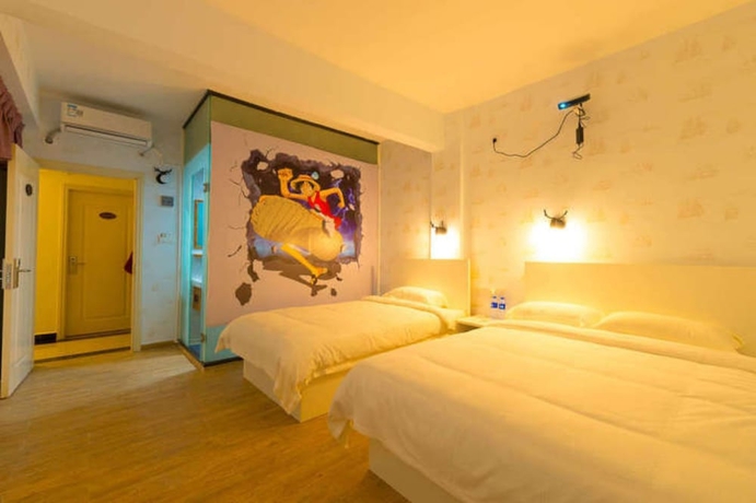Imagen de la habitación del Hotel Jiulongwan Boutique Apartment. Foto 18