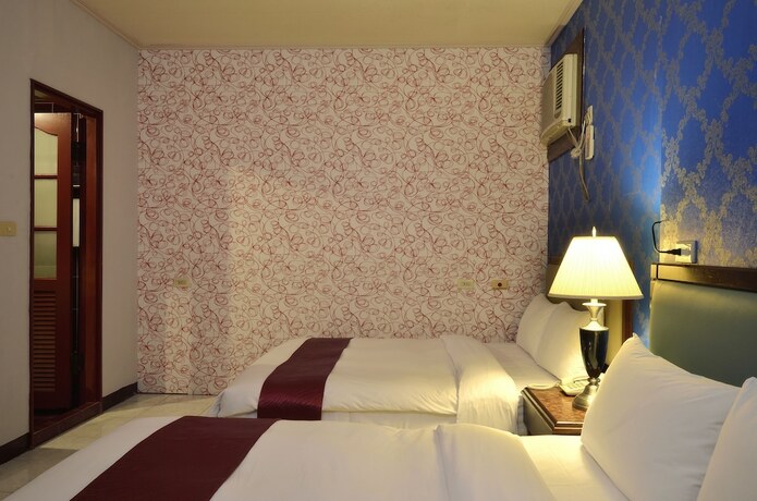 Imagen de la habitación del Hotel Jiuning Business. Foto 14