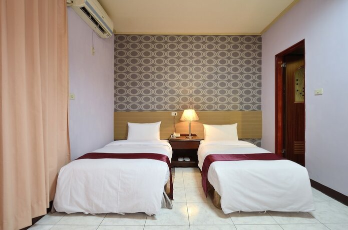 Imagen de la habitación del Hotel Jiuning Business. Foto 15