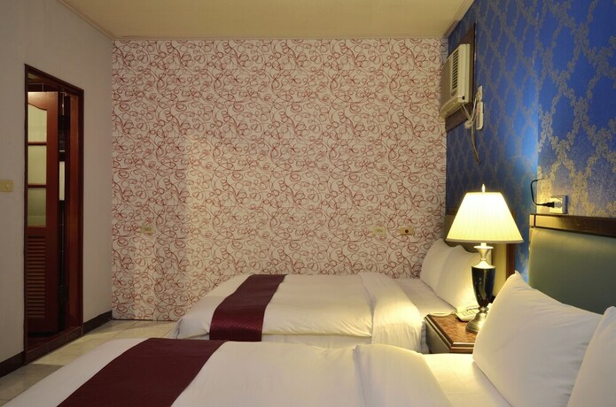 Imagen de la habitación del Hotel Jiuning Business. Foto 17