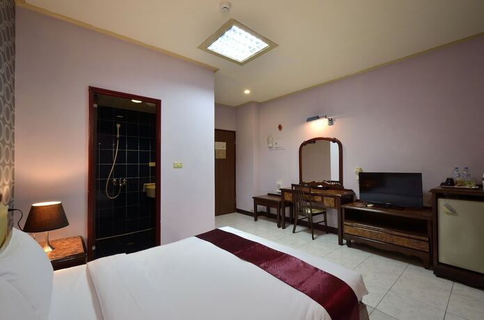 Imagen de la habitación del Hotel Jiuning Business. Foto 18