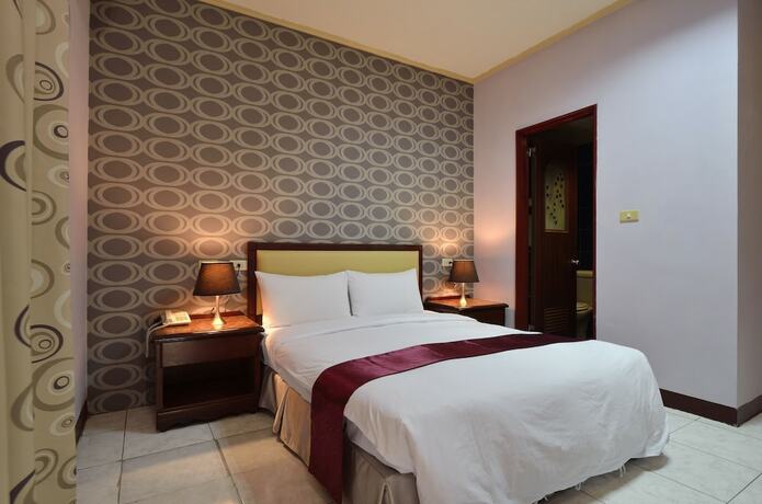 Imagen de la habitación del Hotel Jiuning Business. Foto 20