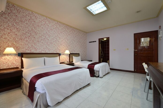 Imagen de la habitación del Hotel Jiuning Business. Foto 21