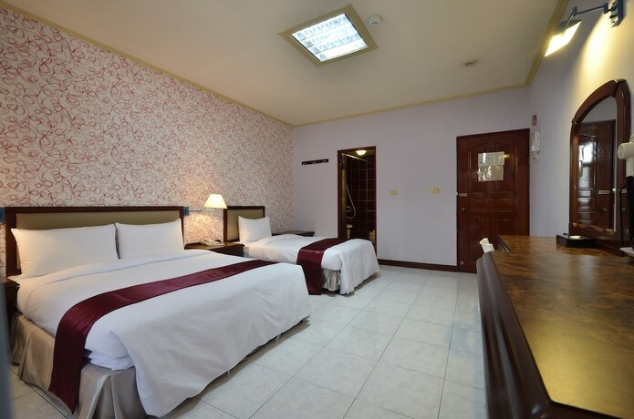 Imagen de la habitación del Hotel Jiuning Business. Foto 23