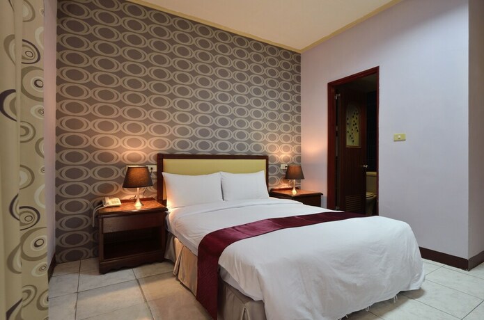 Imagen de la habitación del Hotel Jiuning Business. Foto 25