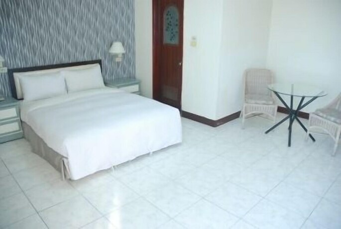 Imagen de la habitación del Hotel Jiuning Business. Foto 27