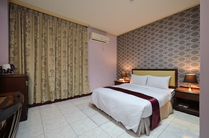 Imagen de la habitación del Hotel Jiuning Business. Foto 28