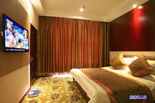 Imagen de la habitación del Hotel Jiuquan Longteng. Foto 2