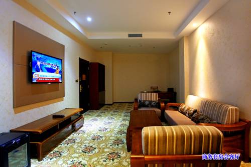 Imagen de la habitación del Hotel Jiuquan Longteng. Foto 4