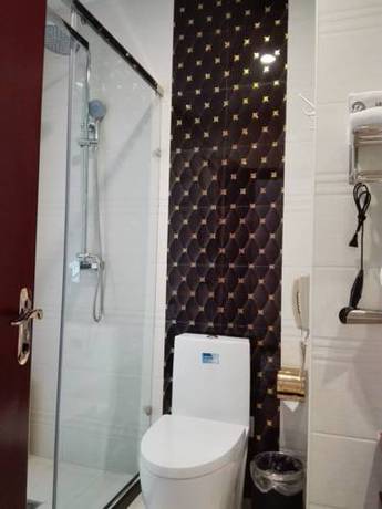 Imagen de la habitación del Hotel Jiuquan Longteng. Foto 5