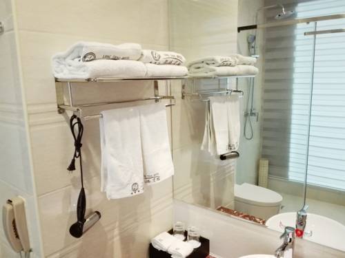 Imagen de la habitación del Hotel Jiuquan Longteng. Foto 6