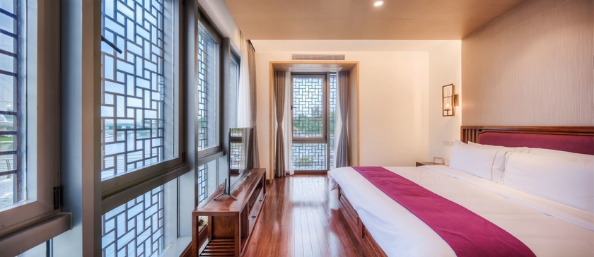 Imagen de la habitación del Hotel Jiushu Resorts Wuxi. Foto 6