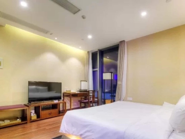 Imagen de la habitación del Hotel Jiushu Resorts Wuxi. Foto 9