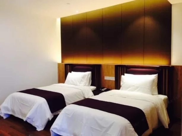 Imagen de la habitación del Hotel Jiushu Resorts Wuxi. Foto 12