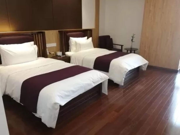 Imagen de la habitación del Hotel Jiushu Resorts Wuxi. Foto 13