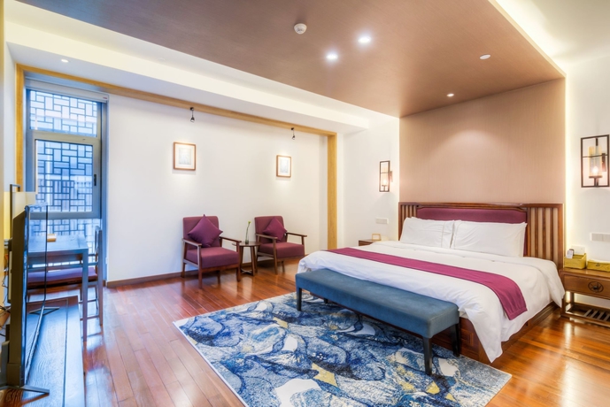 Imagen de la habitación del Hotel Jiushu Resorts Wuxi. Foto 17