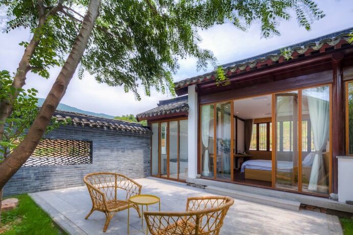 Imagen de la habitación del Hotel Jiushu Shuiyue Resorts. Foto 2