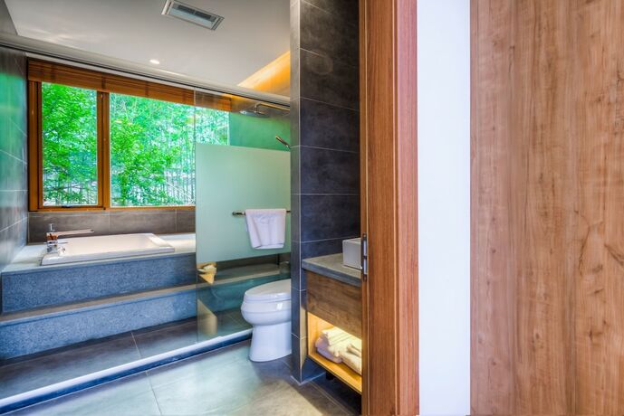 Imagen de la habitación del Hotel Jiushu Shuiyue Resorts. Foto 4