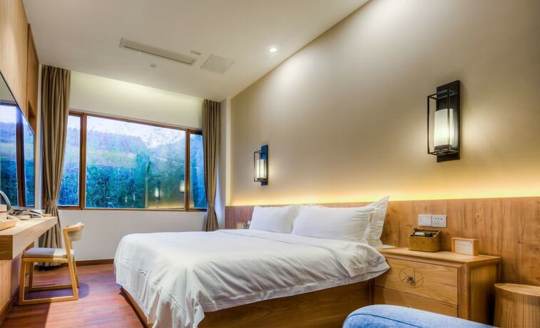 Imagen de la habitación del Hotel Jiushu Shuiyue Resorts. Foto 6