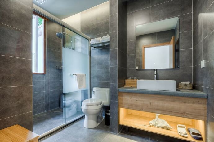 Imagen de la habitación del Hotel Jiushu Shuiyue Resorts. Foto 8