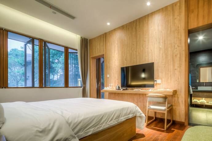 Imagen de la habitación del Hotel Jiushu Shuiyue Resorts. Foto 10