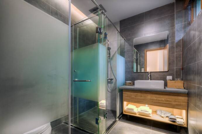 Imagen de la habitación del Hotel Jiushu Shuiyue Resorts. Foto 12