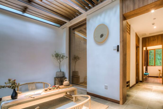 Imagen de la habitación del Hotel Jiushu Shuiyue Resorts. Foto 13