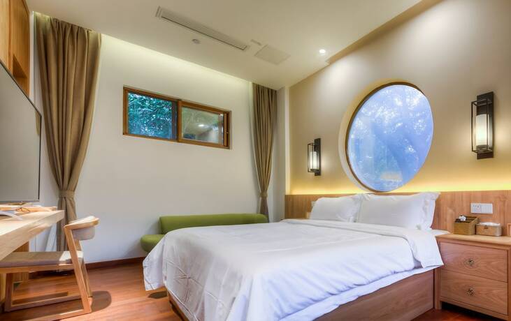Imagen de la habitación del Hotel Jiushu Shuiyue Resorts. Foto 14