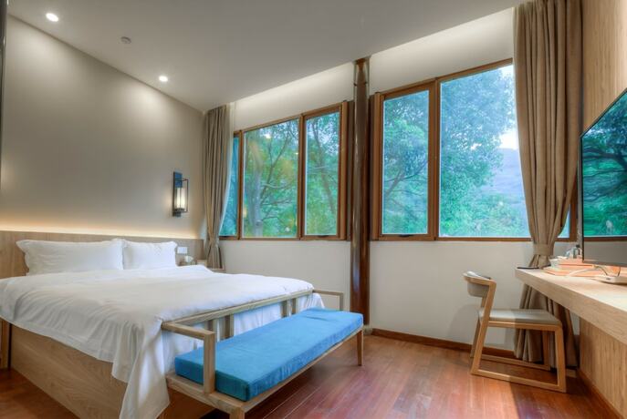 Imagen de la habitación del Hotel Jiushu Shuiyue Resorts. Foto 19