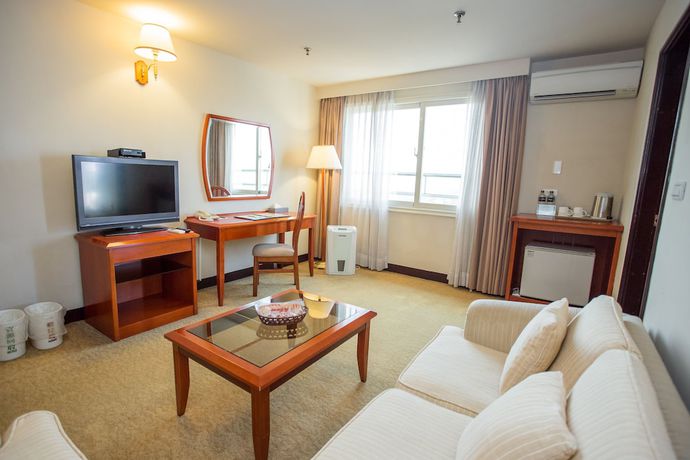 Imagen de la habitación del Hotel Jiuwu. Foto 2