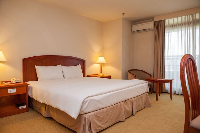 Imagen de la habitación del Hotel Jiuwu. Foto 3