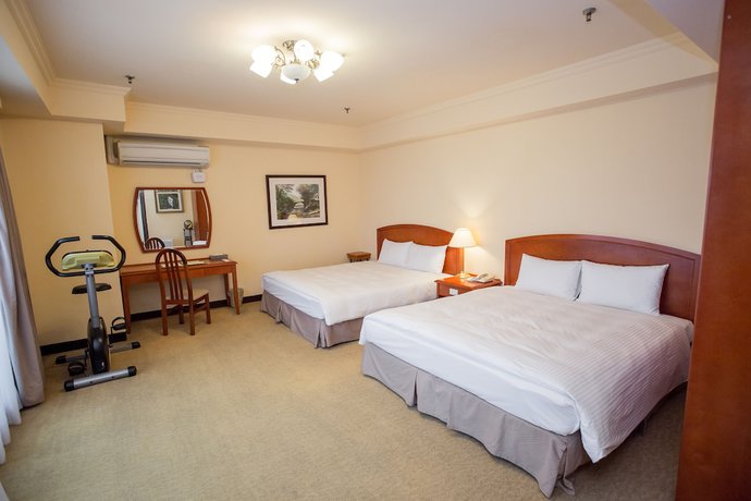 Imagen de la habitación del Hotel Jiuwu. Foto 4