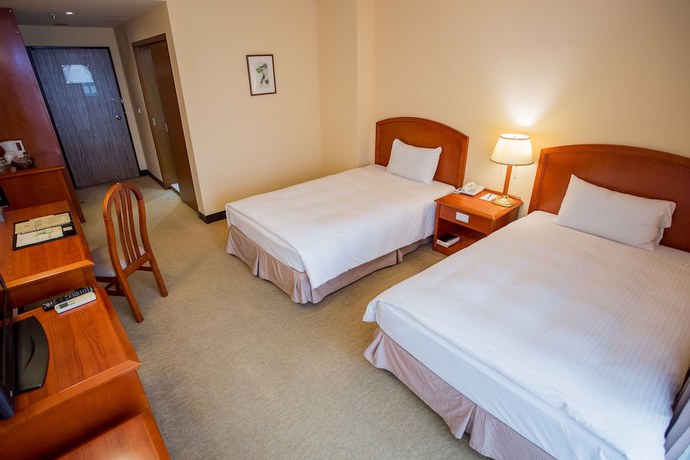 Imagen de la habitación del Hotel Jiuwu. Foto 5