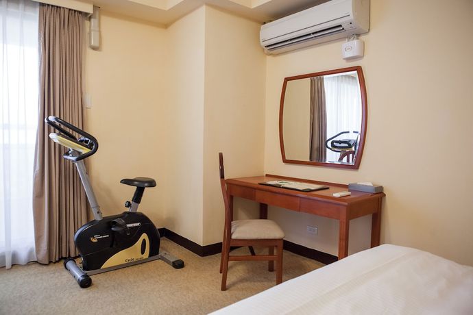 Imagen de la habitación del Hotel Jiuwu. Foto 9