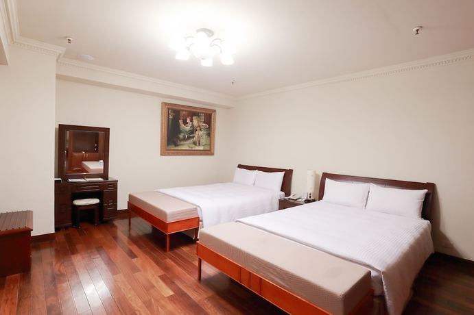 Imagen de la habitación del Hotel Jiuwu. Foto 11