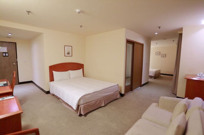 Imagen de la habitación del Hotel Jiuwu. Foto 14