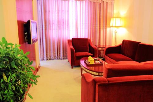 Imagen de la habitación del Hotel Jiuzhaigou Huangpu. Foto 10