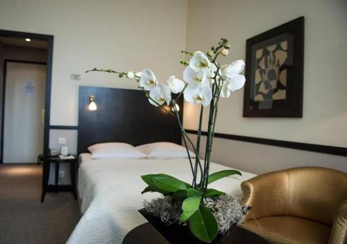 Imagen de la habitación del Hotel Jiuzhaigou Huangpu. Foto 14