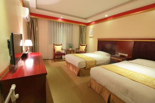 Imagen de la habitación del Hotel Jiuzhaigou Jenny. Foto 2