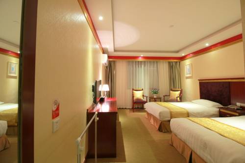 Imagen de la habitación del Hotel Jiuzhaigou Jenny. Foto 3