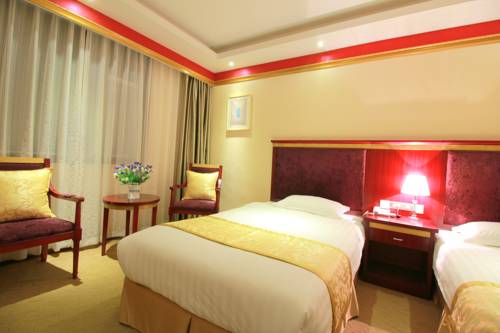 Imagen de la habitación del Hotel Jiuzhaigou Jenny. Foto 5