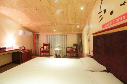 Imagen de la habitación del Hotel Jiuzhaigou Jenny. Foto 6