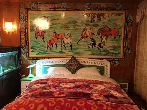 Imagen de la habitación del Hotel Jiuzhaigou Xin Tao Ge Tibetan Inn. Foto 7