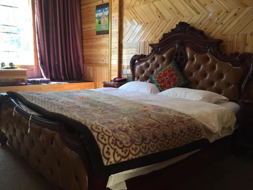 Imagen de la habitación del Hotel Jiuzhaigou Xin Tao Ge Tibetan Inn. Foto 8