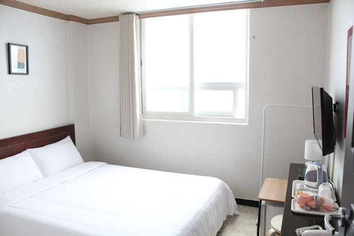 Imagen de la habitación del Hotel Jj Inn. Foto 8