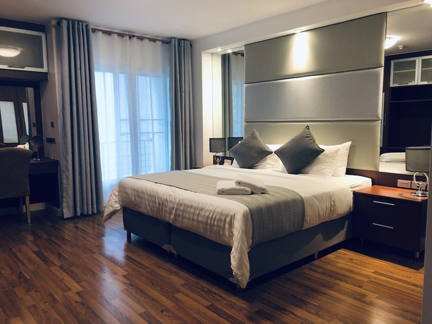 Imagen de la habitación del Hotel Jj Suites - Your Home On 11. Foto 6
