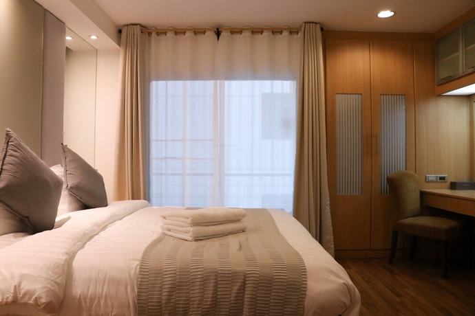 Imagen de la habitación del Hotel Jj Suites - Your Home On 11. Foto 8